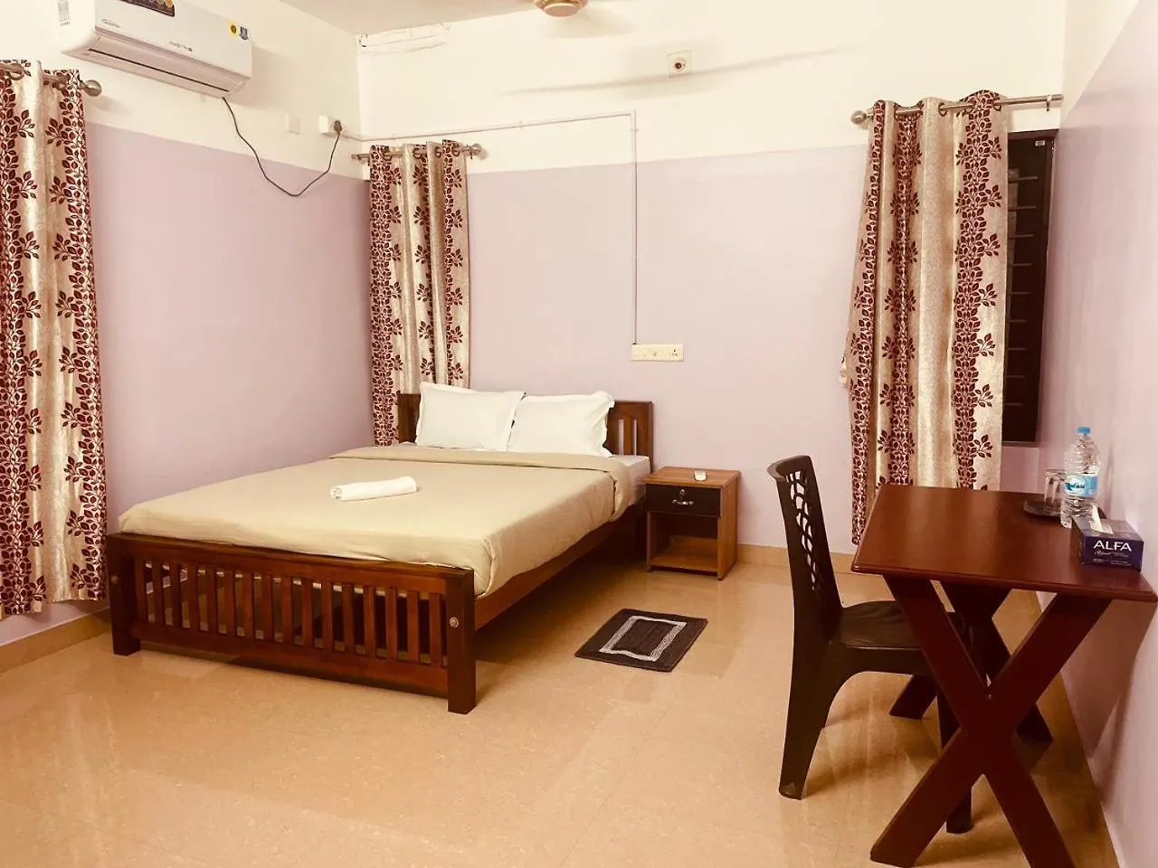 Rum i privatbostad Paddy Castle Lägenhet Varkala